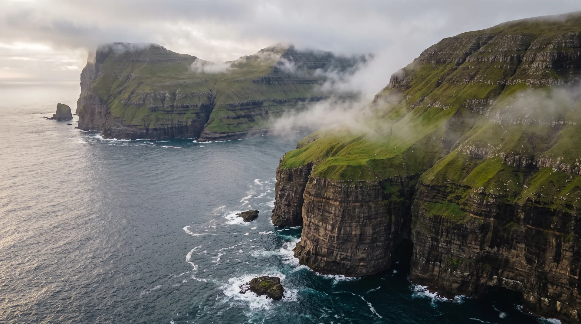 Slow fog over North Atlantic ocean at dusk